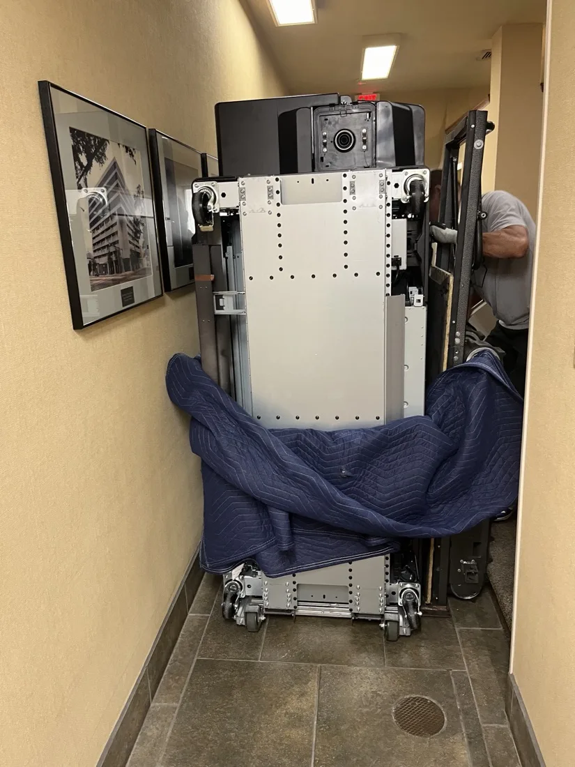 Piano through a commercial corridor