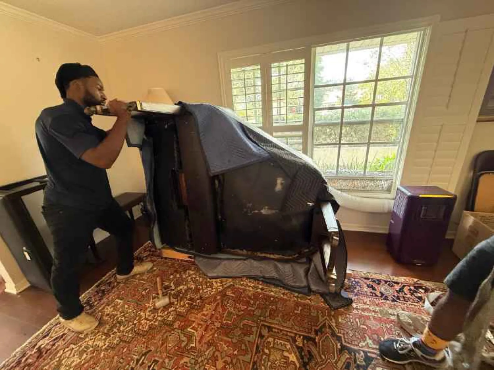 A grand piano delivered to a new build in Longwood